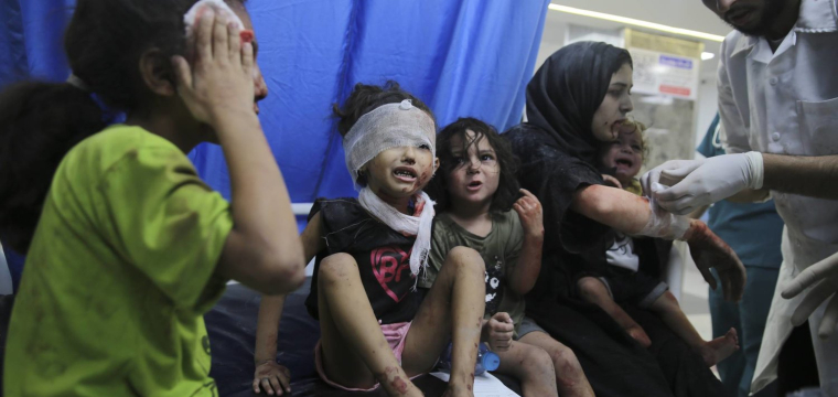 Palestinian children wounded in Israeli strikes are brought to Shifa Hospital in Gaza City on Wednesday, Oct. 11, 2023. (AP Photo/Ali Mahmoud)